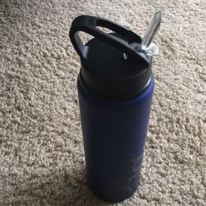 Blue metal bottle with straw